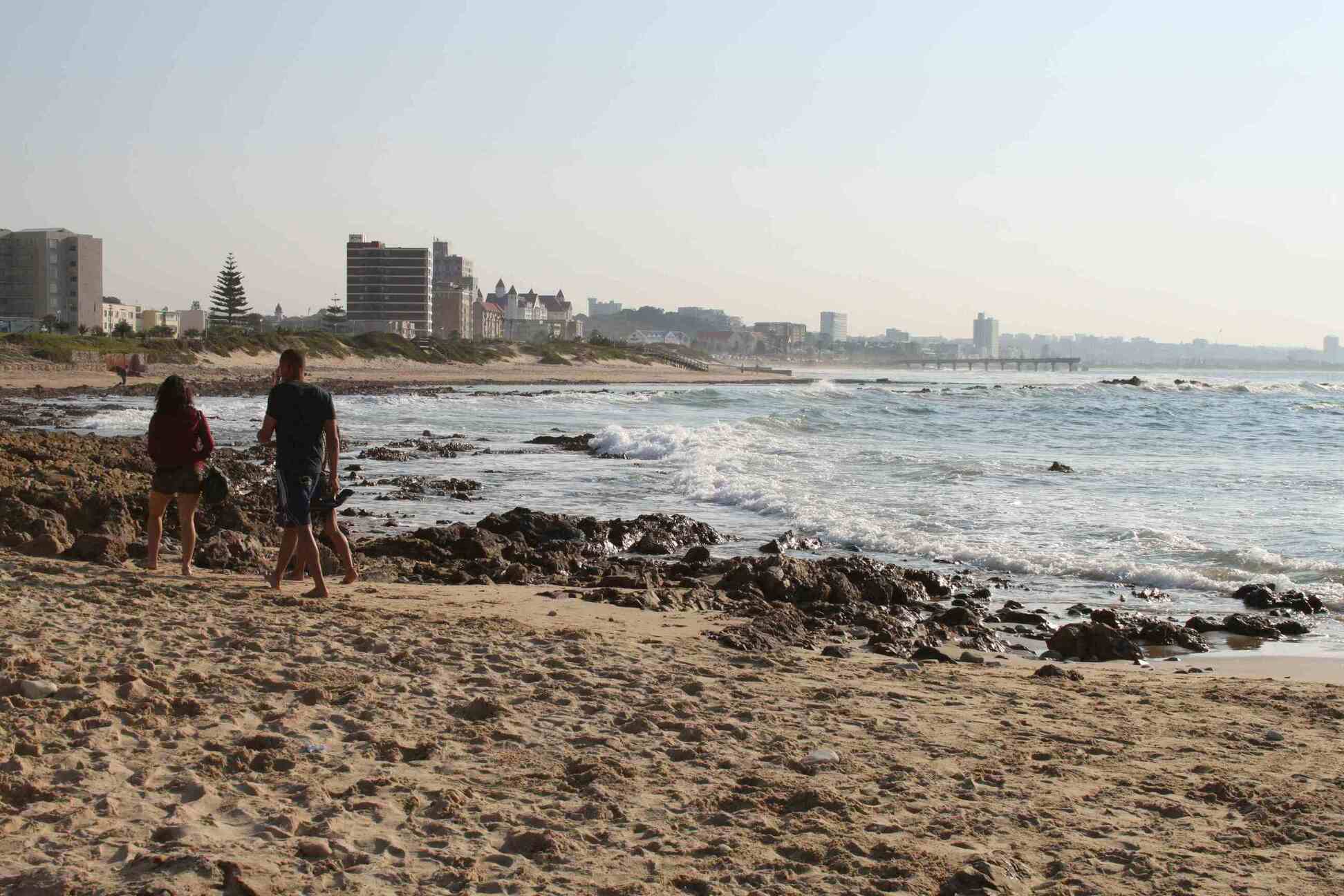 Walkers on beach in Gqeberha or Port Elizabeth
