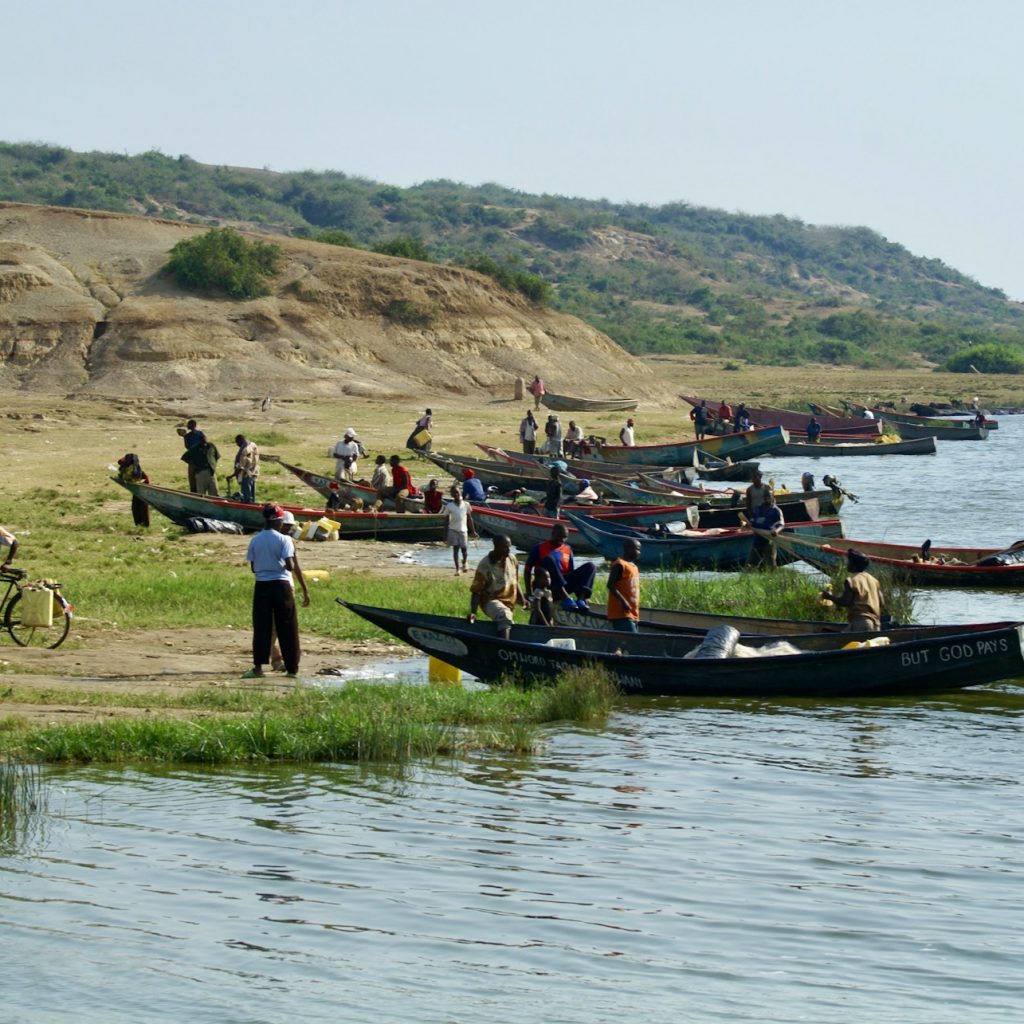 People and canoes Kazinga Channel, Uganda