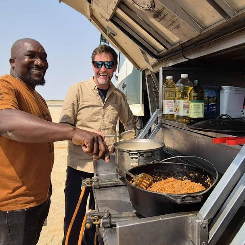 Pitching in together - Cooking with the guide