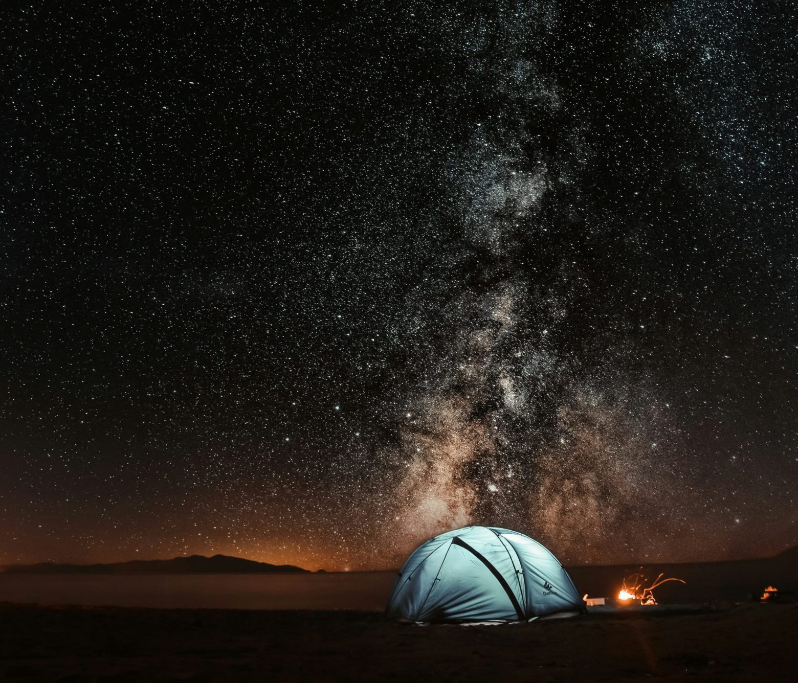 Tent under night sky