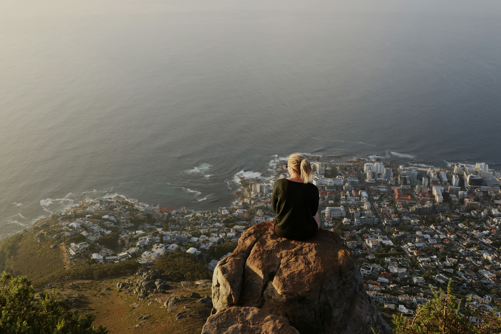 Blonde woman on Lion's Head above Cape Town