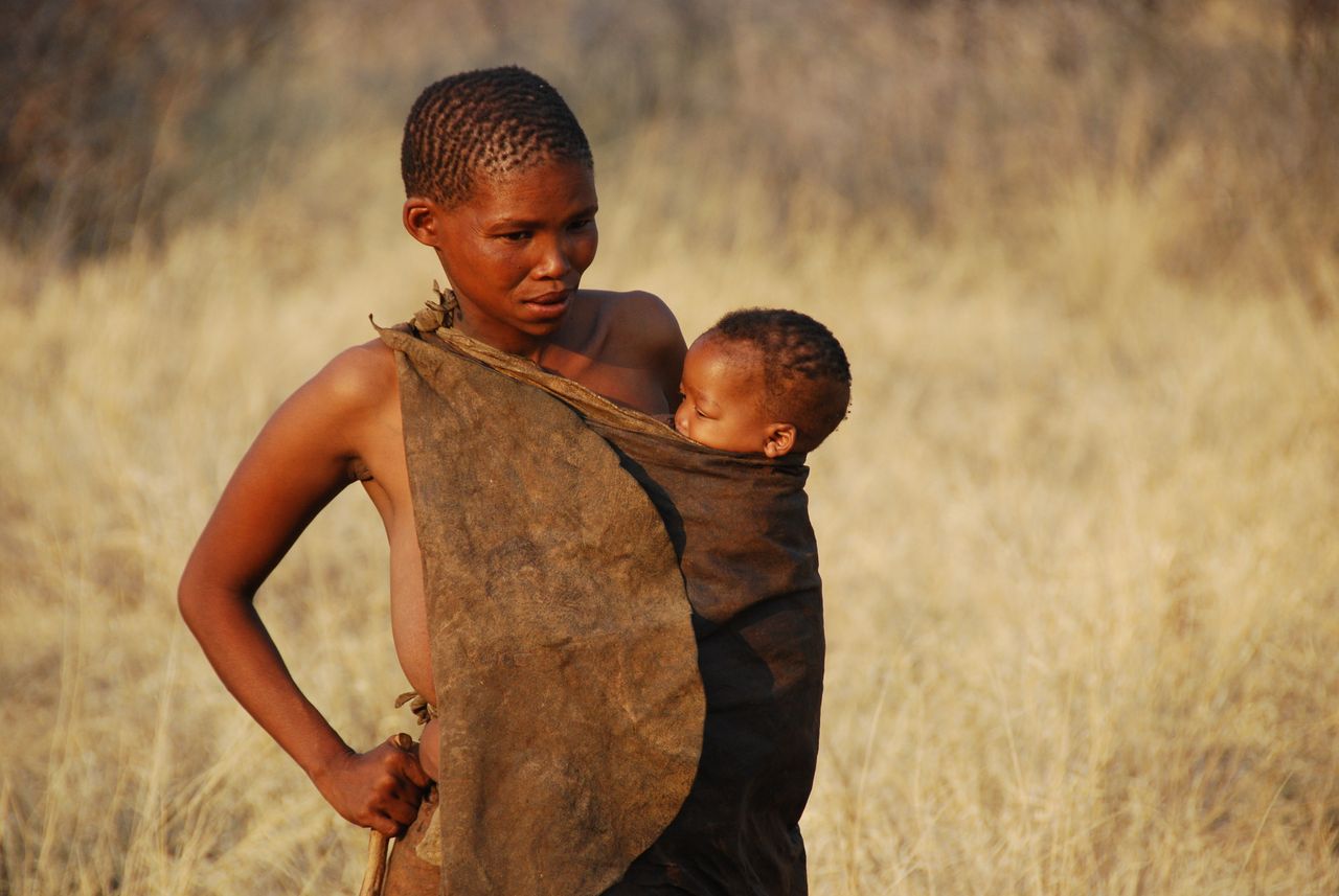 Mother and child in sling, San Bushmen culture