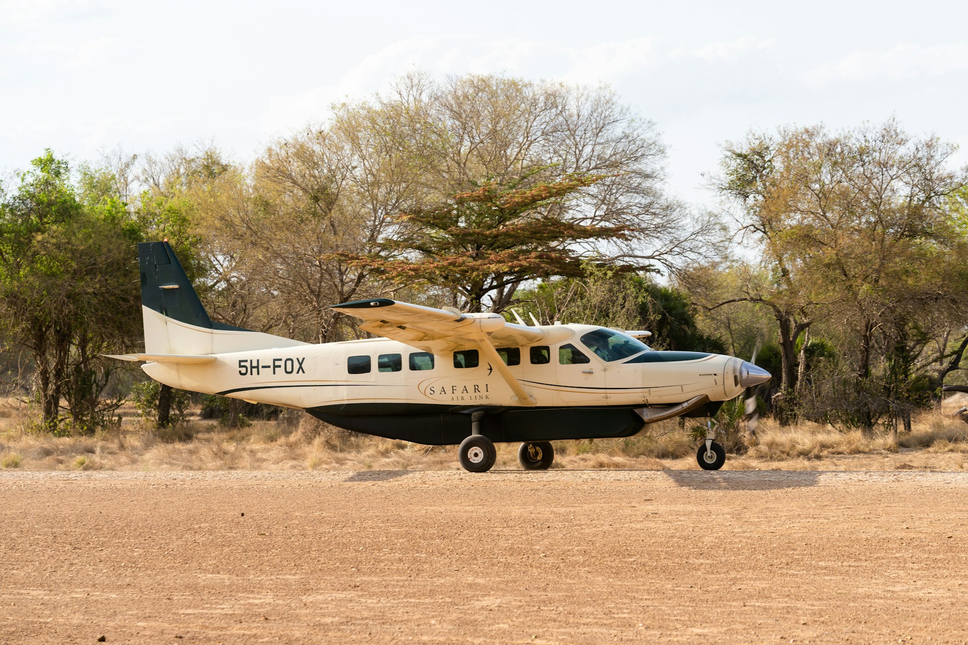 Small plane on Mtemere Airstrip, Kwangwazi, Nyerere NP, Tanzania