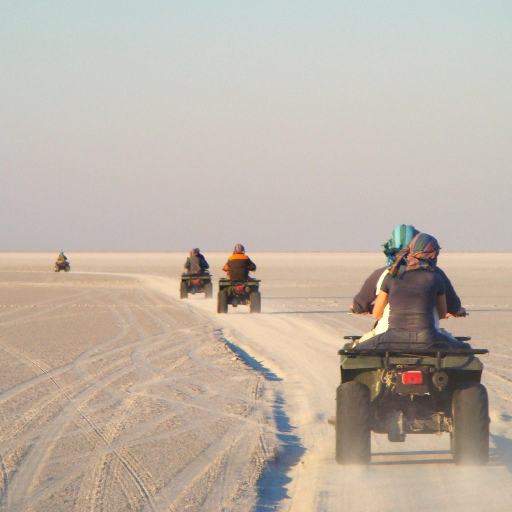 Quad biking across salt pan in Makgadikgadi