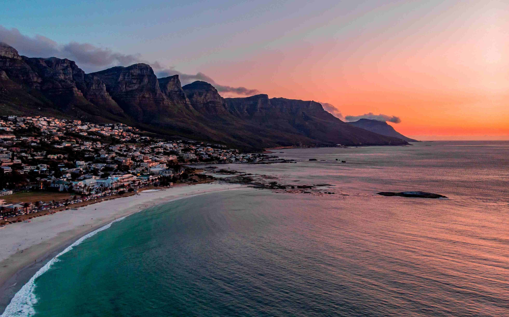 Sunset over camps Bay with 12 Apostles in view