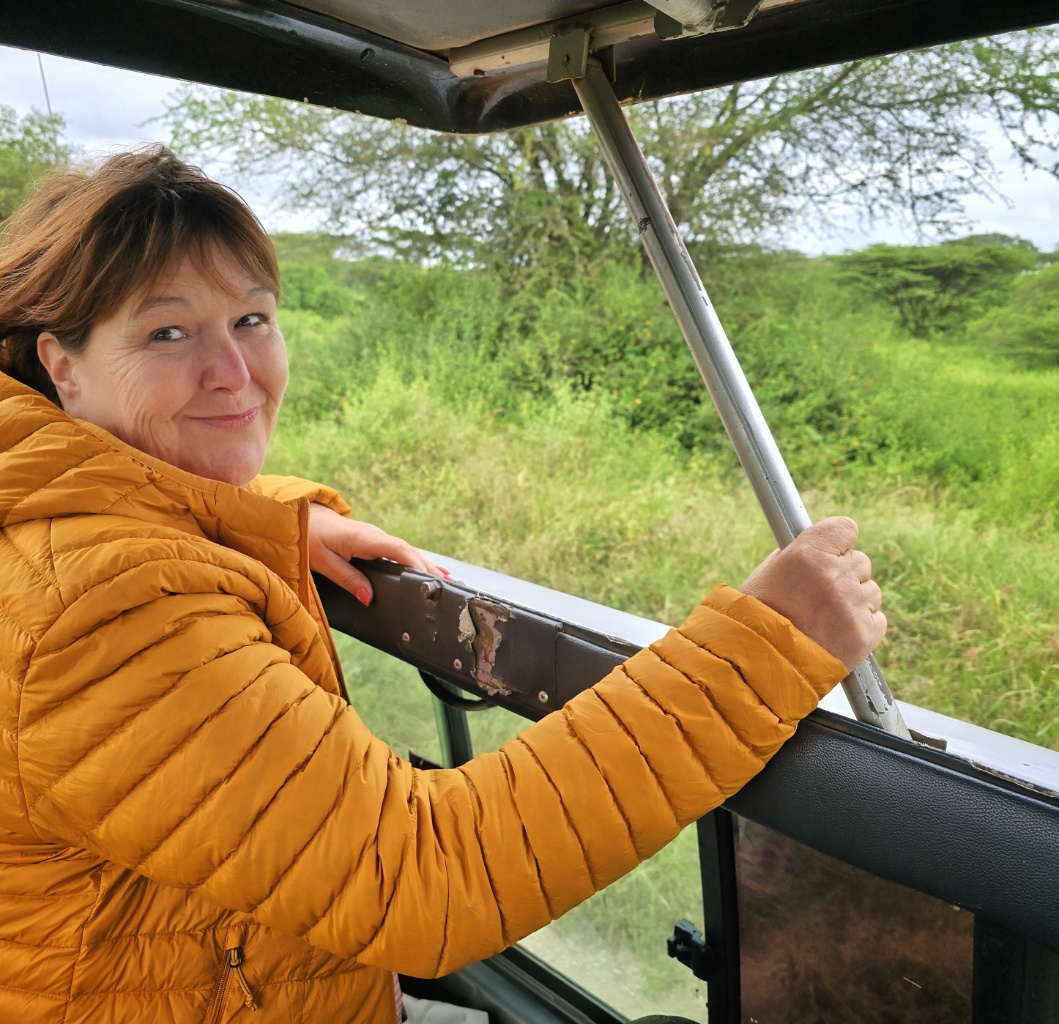 Colleen in 4x4 safari vehicle